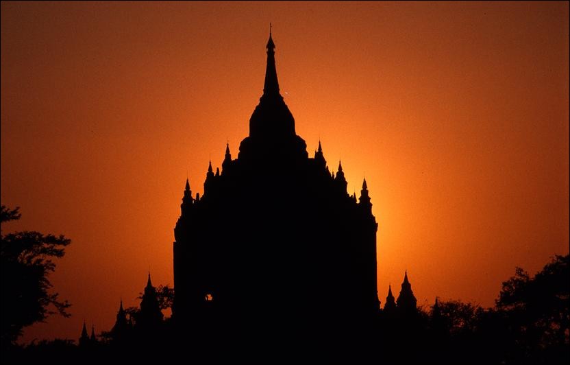 Thathyinnyu Temple silhouetted at sunset, Bagan, Myanmar