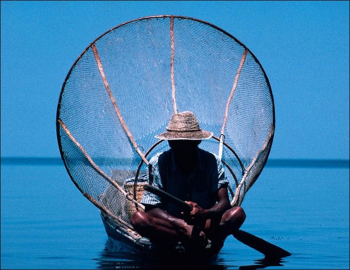 Fisherman with his net on Inle Lake, Myanmar