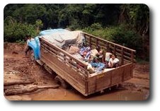 Truck stuck in mud on road from Nam Tha to Huai Xai, Laos