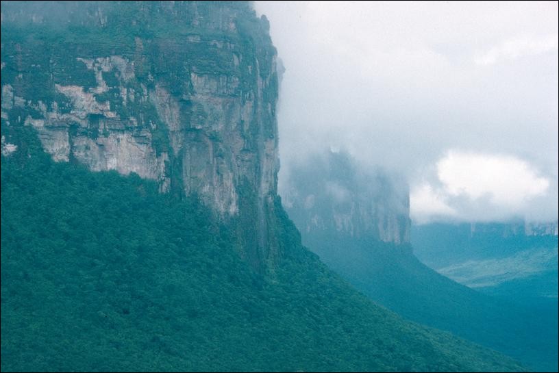Tepuyes rising from the jungle to the clouds, Angel Falls, Venezuela 